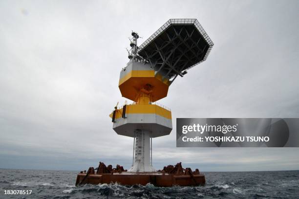 Floating electric substation stands positioned in the sea off the coast of Naraha town in Fukushima prefecture on October 4, 2013. Japan's floating...