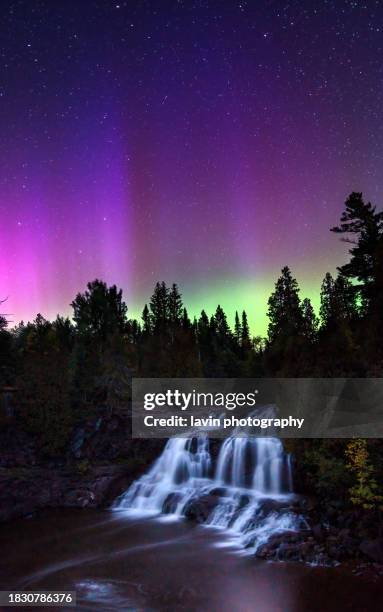 northern lights over waterfall - duluth stock pictures, royalty-free photos & images