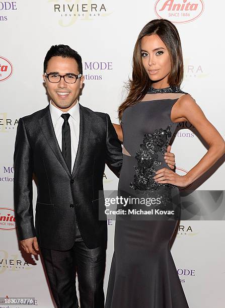 Designer Walter Mendez and model Sarah Stage arrive for A la mode Productions Presents Designers Night Out at Sofitel Hotel on October 3, 2013 in Los...