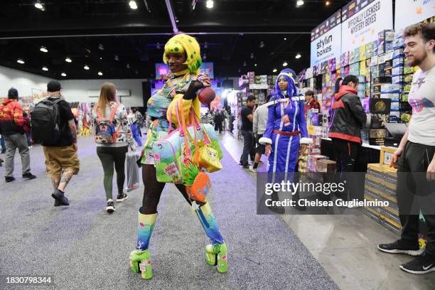 Cosplayer dressed in a "SpongeBob SquarePants" costume poses at Los Angeles Comic Con at Los Angeles Convention Center on December 03, 2023 in Los...