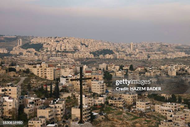 Picture taken from the Palestinian biblical city of Bethlehem shows a view of the Israeli settlement of Har Homa, in the occupied West Bank, on...