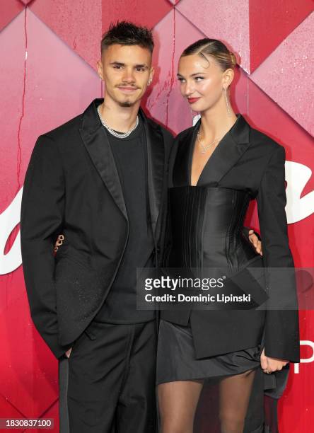 Romeo Beckham and Mia Regan attend The Fashion Awards 2023 presented by Pandora at the Royal Albert Hall on December 04, 2023 in London, England.
