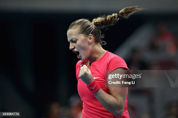 Petra Kvitova of Czech Republic celebrates during her women's singles match against Li Na of China on day seven of the 2013 China Open at the...