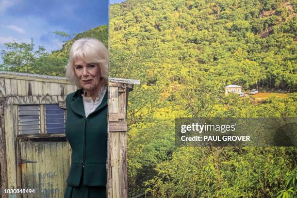 Britain's Queen Camilla visits the Frank Walter Exhibition, celebrating the Antiguan artist with a landscape view of his home in Antigua, as she...