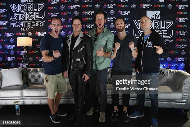 Chuck Comeau, David Desrosiers, Pierre Bouvier, Sebastien Lefebvre, Jeff Stinco of Simple Plan attend a press conference during the MTV World Stage...