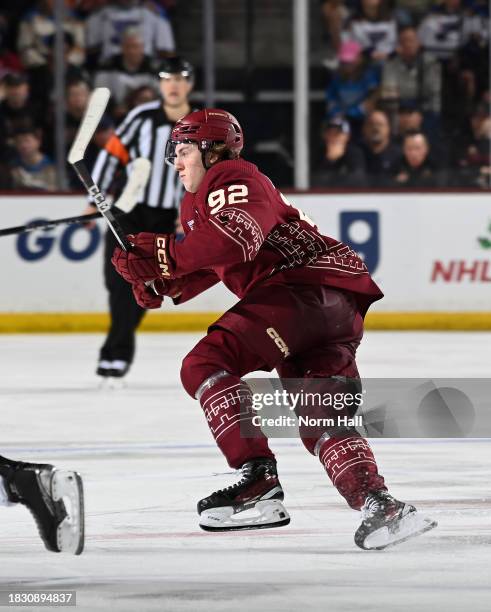 Logan Cooley of the Arizona Coyotes skates up ice against the St Louis Blues at Mullett Arena on December 02, 2023 in Tempe, Arizona.