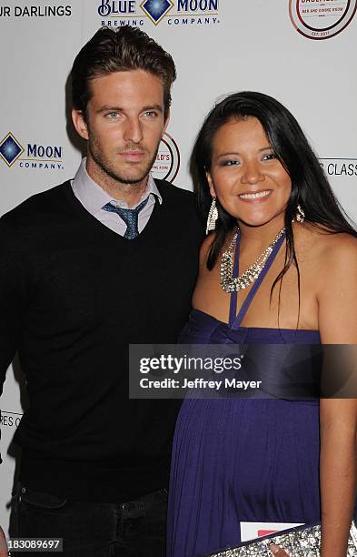 Actors Alex Hafner and Misty Upham arrive at the Los Angeles premiere of 'Kill Your Darlings' at the Writers Guild Theater on October 3, 2013 in...