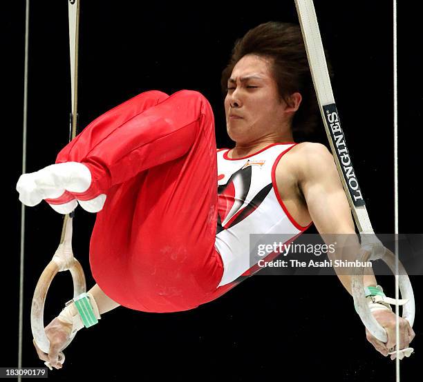 Ryohei Kato of Japan competes in the Rings of the Men's All-Around Final during Day Four of the Artistic Gymnastics World Championships Belgium 2013...