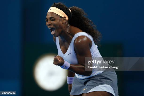 Serena Williams of the United States celebrates a ball during her women's quarterfinals match against Caroline Wozniacki of Denmark on day seven of...