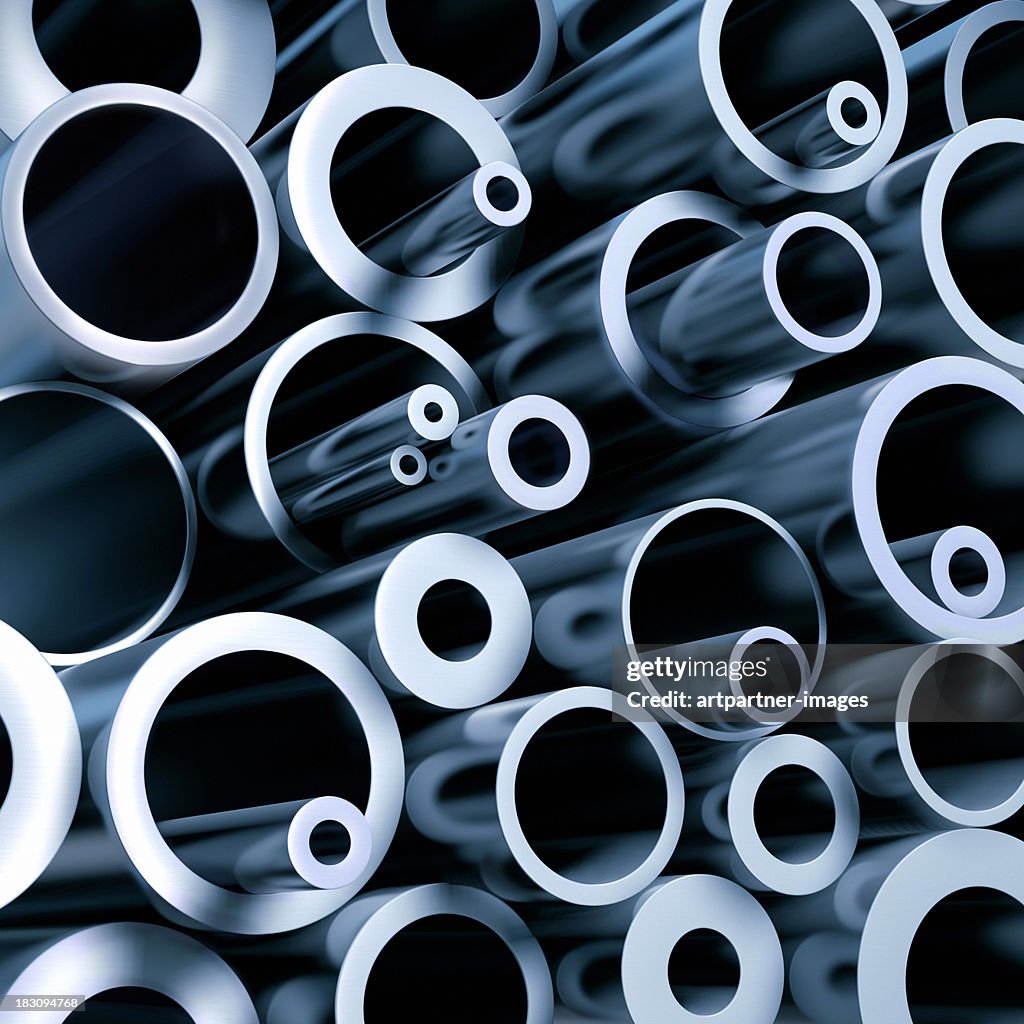 A stack of various metall pipes