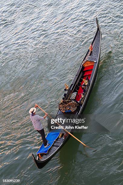 gondolier on the grand canal - gondolier stock pictures, royalty-free photos & images