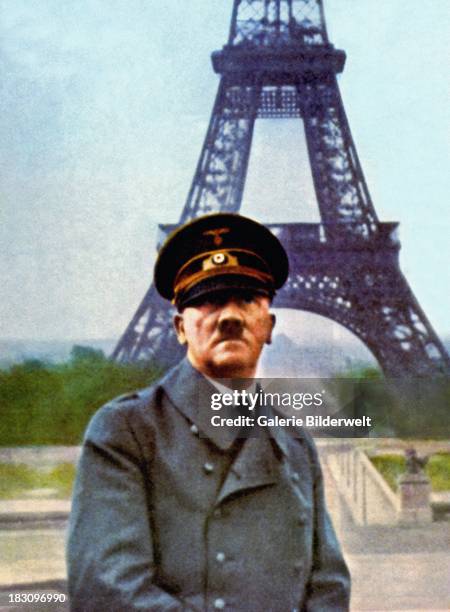 Nazi leader Adolf Hitler posing in front of the Eiffel Tower during a visit to Paris the day after the French surrender and the signing of the Second...