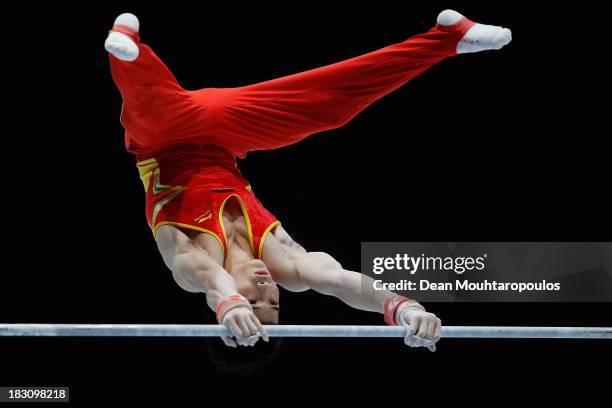 Shixiong Zhou of China competes on the Horizontal Bar during the Mens All-Around Final on Day Four of the Artistic Gymnastics World Championships...