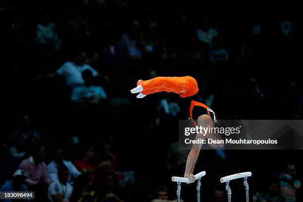 Bart Deurloo of the Netherlands competes on the Parallel Bars during the Mens All-Around Final on Day Four of the Artistic Gymnastics World...