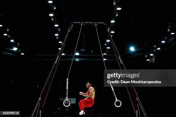 Chaopan Lin of China competes in the Rings during the Mens All-Around Final on Day Four of the Artistic Gymnastics World Championships Belgium 2013...