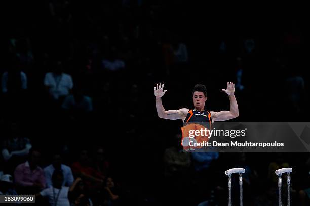 Casimir Schmidt of the Netherlands competes on the Parallel Bars during the Mens All-Around Final on Day Four of the Artistic Gymnastics World...