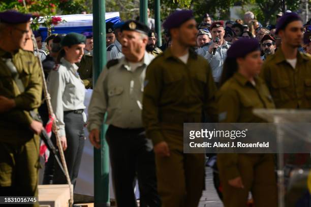 Lt. Col. Shai Avramson , IDF Chief Cantor, leads the processional and casket for Col. Asaf Hamami, commander of Gaza Division's Southern Brigade,...