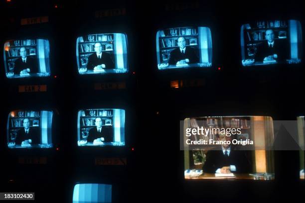 Monitors at RAI television studios display Silvio Berlusconi broadcasting a video message that announces his debut in politics on January 26, 1994 in...