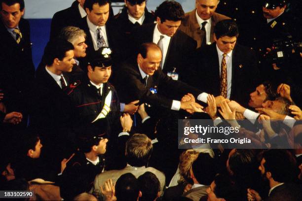 Silvio Berlusconi acknowledges the crowd during a rally for Forza Italia party at Palazzo Dei Congressi on February 6, 1994 in Rome, Italy.