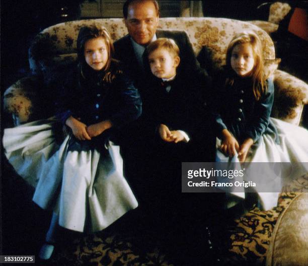 Young Silvio Berlusconi with his children Barbara, Luigi and Eleonora in his villa near Milan in 1994 ca. In Milan, Italy.