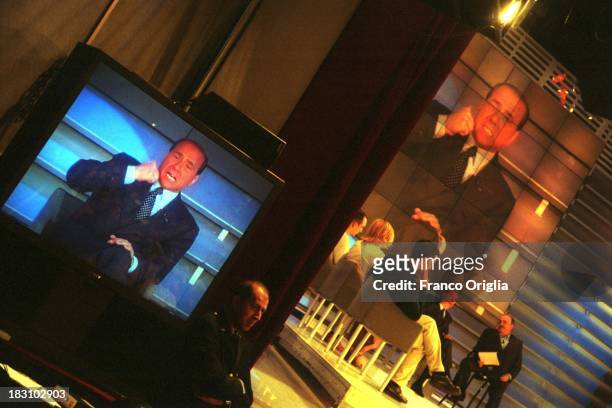 Candidate Prime Minister Silvio Berlusconi and journalist Maurizio Costanzo attend the 'Maurizio Costanzo Show', popular talk show on Berlusconi's...