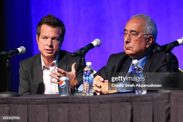 Sunivo executive Cory Hudson and television personality Ben Stein speak onstage during Sunivo's 1st Annual CHINA NOW Summit at the Hyatt Regency...