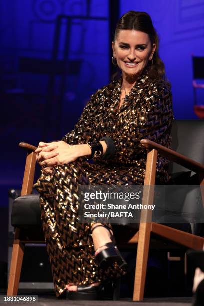 Penélope Cruz speaks on stage during the BAFTA: 'A Life In Pictures with Penélope Cruz' event held at BAFTA on December 04, 2023 in London, England.