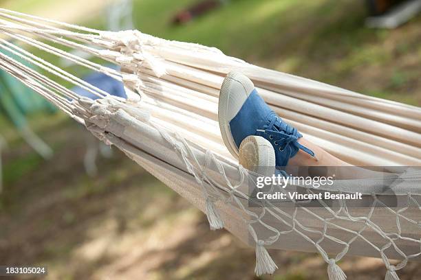 close up of feet in a ham - blue shoe stock pictures, royalty-free photos & images
