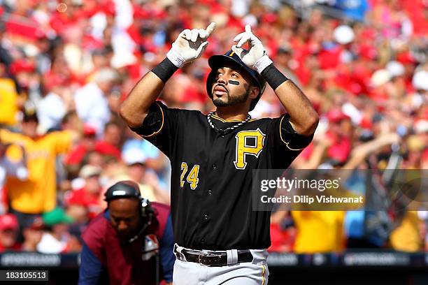 Pedro Alvarez of the Pittsburgh Pirates celebrates after hitting a two-run home run in the third inning against the St. Louis Cardinals during Game...
