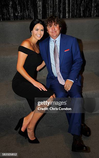 Amanda Dufner and husband Jason Dufner of the U.S. Team backstage at the opening ceremonies at Columbus Commons prior to the start of The Presidents...