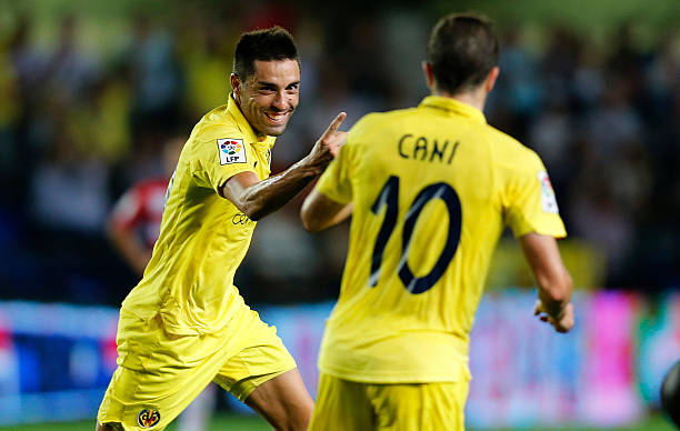 Villarreal's midfielder Bruno Soriano celebrates his goal with Villarreal's midfielder Cani during the Spanish league football match Villarreal CF vs...