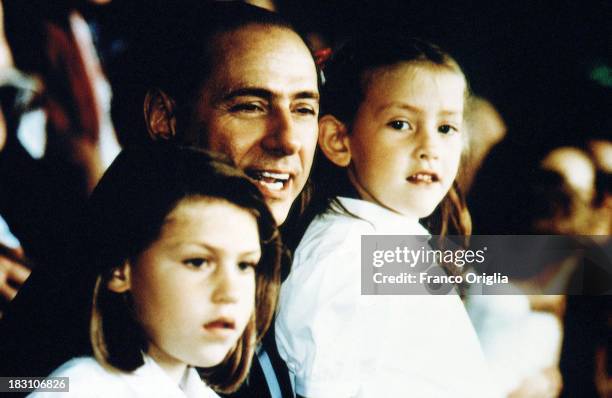 Silvio Berlusconi, President of football team A.C. Milan, and his daughters Eleonora and Barbara attend a match at the Giuseppe Meazza San Siro...