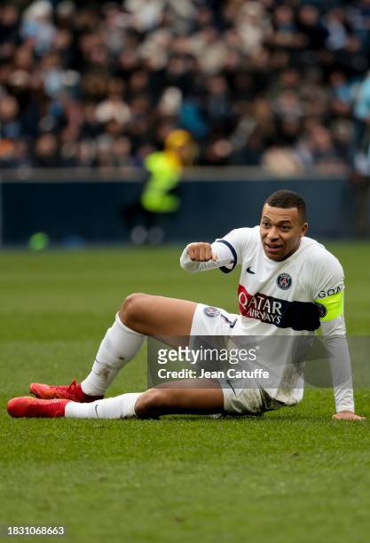 Kylian Mbappe of PSG looks on during the Ligue 1 Uber Eats match between Le Havre AC and Paris Saint-Germain at Stade Oceane on December 3, 2023 in...