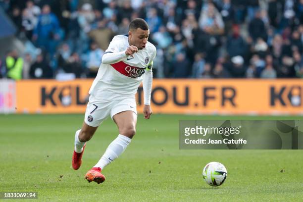 Kylian Mbappe of PSG in action during the Ligue 1 Uber Eats match between Le Havre AC and Paris Saint-Germain at Stade Oceane on December 3, 2023 in...