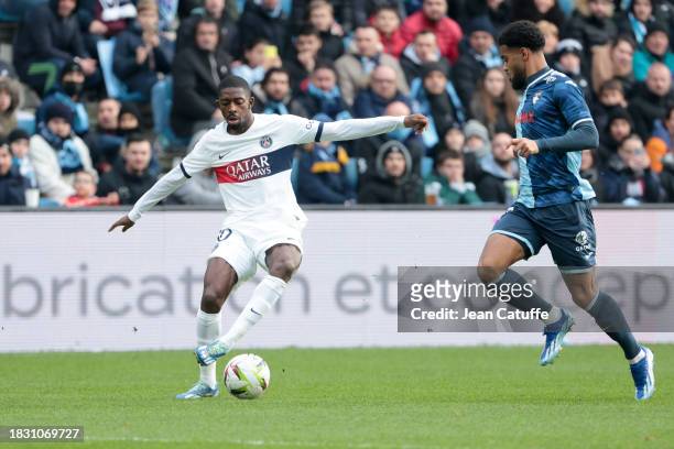Ousmane Dembele of PSG in action during the Ligue 1 Uber Eats match between Le Havre AC and Paris Saint-Germain at Stade Oceane on December 3, 2023...