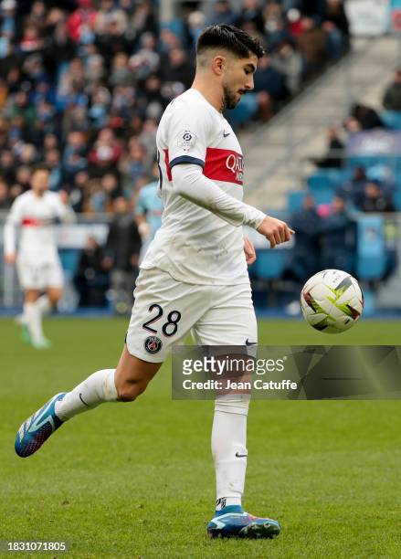 Carlos Soler of PSG in action during the Ligue 1 Uber Eats match between Le Havre AC and Paris Saint-Germain at Stade Oceane on December 3, 2023 in...