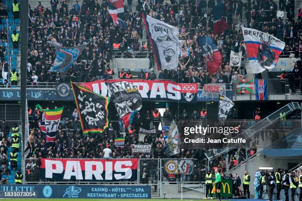 Supporters of PSG during the Ligue 1 Uber Eats match between Le Havre AC and Paris Saint-Germain at Stade Oceane on December 3, 2023 in Le Havre,...