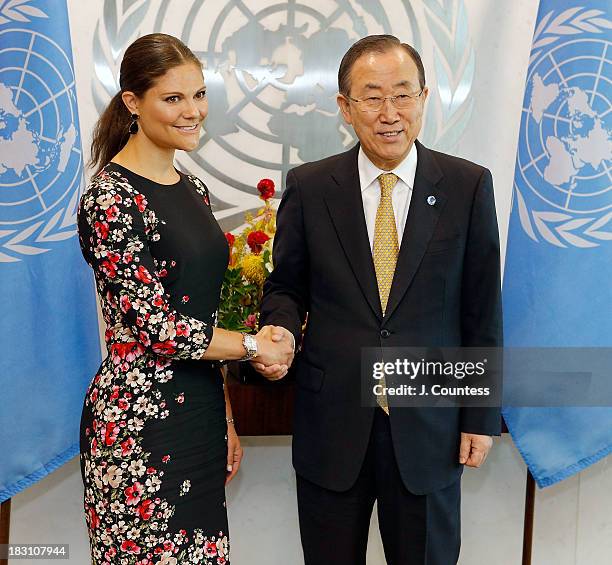 Crown Princess Victoria Of Sweden shakes hands with United Nations Secretary General Ban Ki-moon during a visit to the United Nations on October 4,...