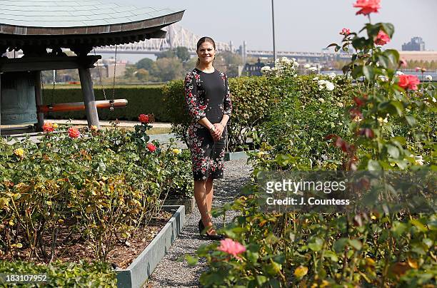 Crown Princess Victoria Of Sweden poses for a photo in the United Nations Rose garden during a visit to the United Nations on October 4, 2013 in New...