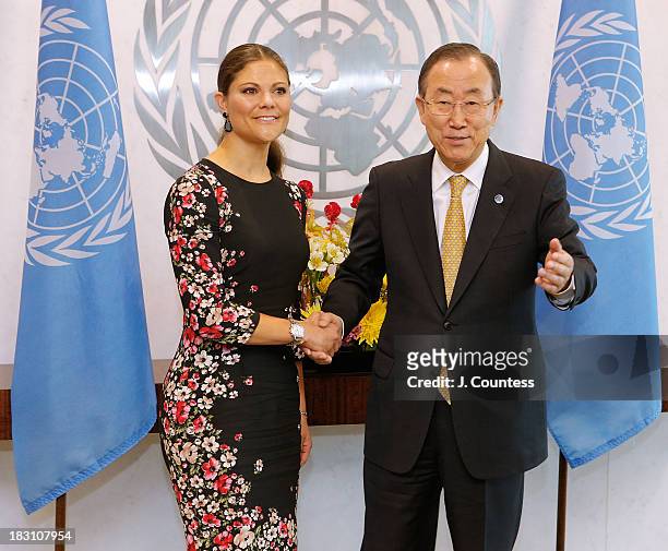 Crown Princess Victoria Of Sweden shakes hands with United Nations Secretary General Ban Ki-moon during a visit to the United Nations on October 4,...