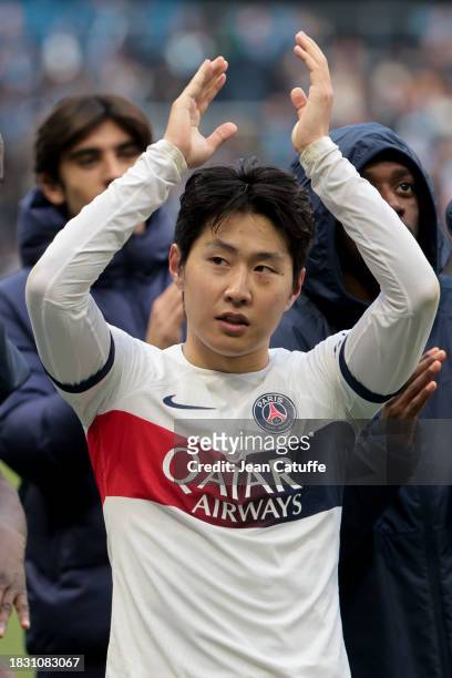 Lee Kang-in of PSG salutes the supporters following the Ligue 1 Uber Eats match between Le Havre AC and Paris Saint-Germain at Stade Oceane on...