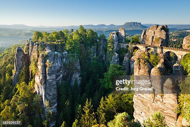 bastei at sunrise - elbsandsteingebirge stock-fotos und bilder