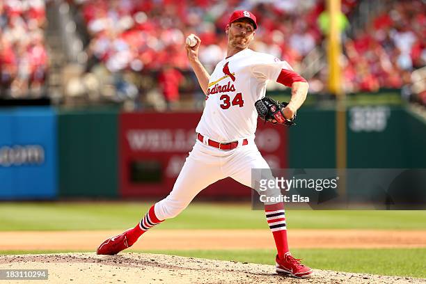 John Axford of the St. Louis Cardinals pitches in the sixth inning against the Pittsburgh Pirates during Game Two of the National League Division...