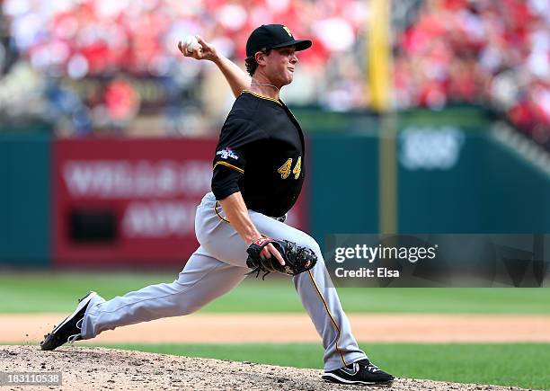 Tony Watson of the Pittsburgh Pirates pitches against the St. Louis Cardinals during Game Two of the National League Division Series at Busch Stadium...