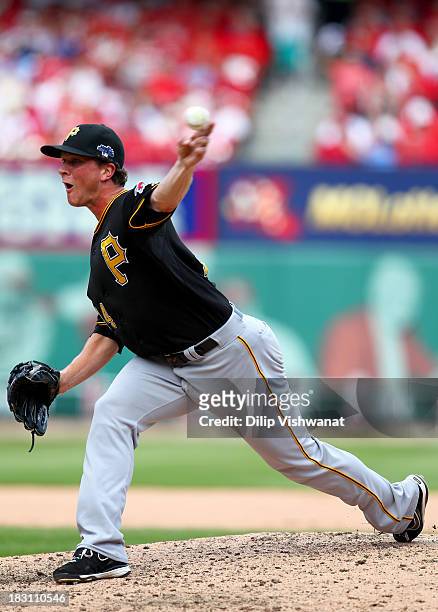 Tony Watson of the Pittsburgh Pirates pitches against the St. Louis Cardinals during Game Two of the National League Division Series at Busch Stadium...