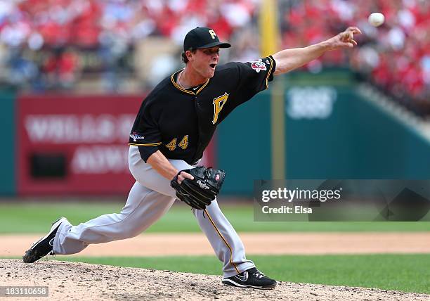 Tony Watson of the Pittsburgh Pirates pitches against the St. Louis Cardinals during Game Two of the National League Division Series at Busch Stadium...