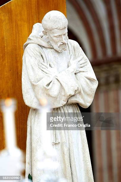 Detail of the statue of Saint Francis as Pope Francis holds a Mass at the Sacro Convento and Saint Francis Basilica on October 4, 2013 in Assisi,...