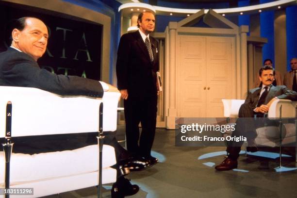 Candidates Prime Minister Silvio Berlusconi and Massimo D'Alema and presenter Bruno Vespa attend talk show 'Porta A Porta' on tv channel Rai Uno, as...