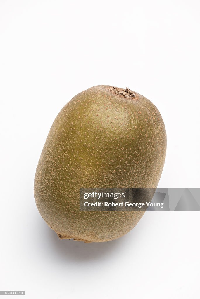 Highly detailed close-up of a golden kiwi fruit