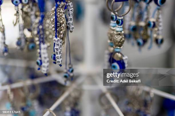 keyring souvenir hanging at the shop (cyprus) - greek worry beads stock pictures, royalty-free photos & images